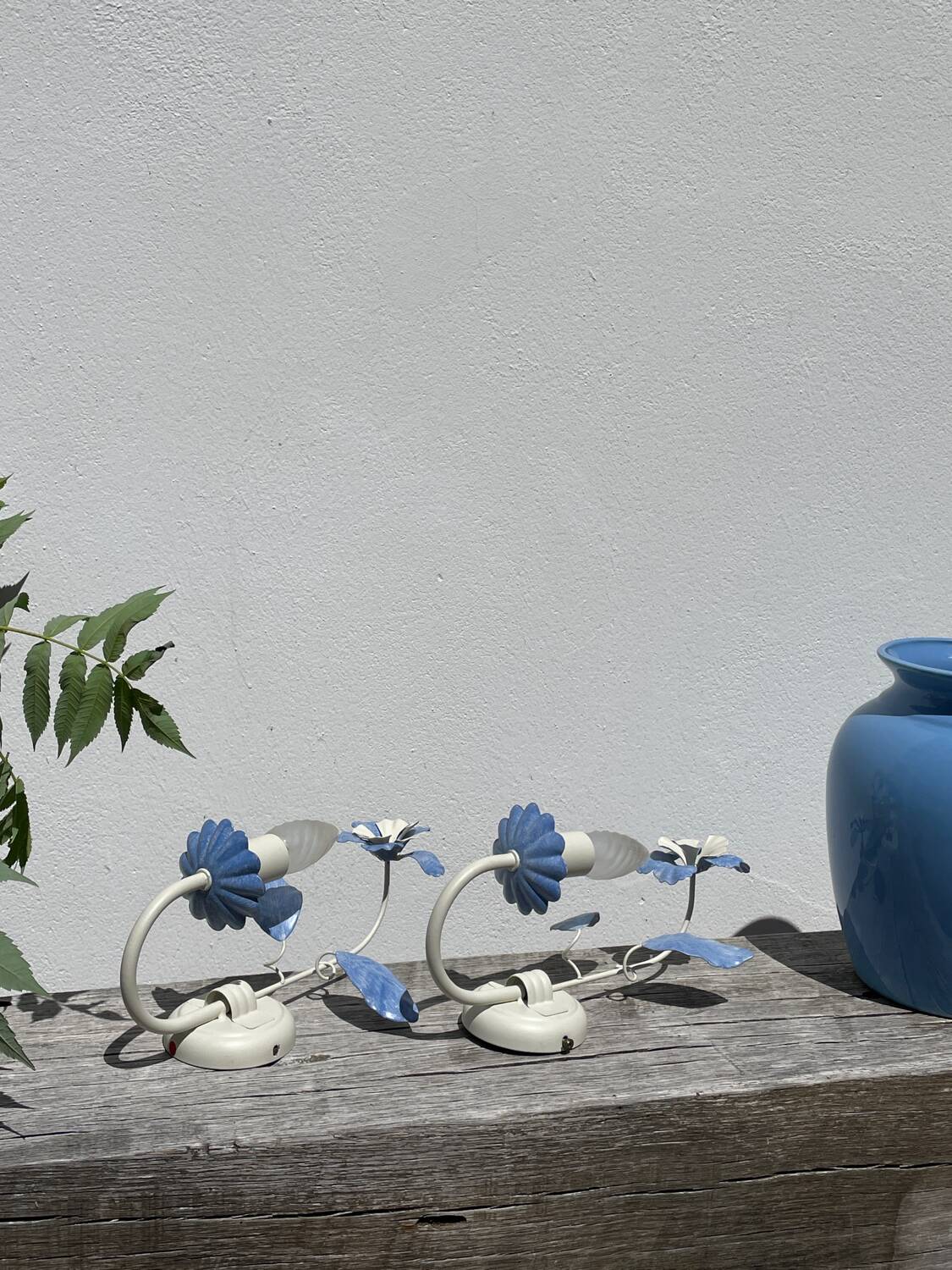 Pair of blue metal floral wall lights