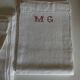Set de 6 serviettes en lin caviar 1930 brodées MG rouge 65 x 85