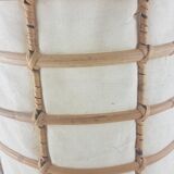 Lamp to be laid in rattan and fabric