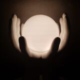 Italian design ceramic table lamp two hands and a glass sphere