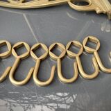 Art-deco wall-mounted coat rack in brass