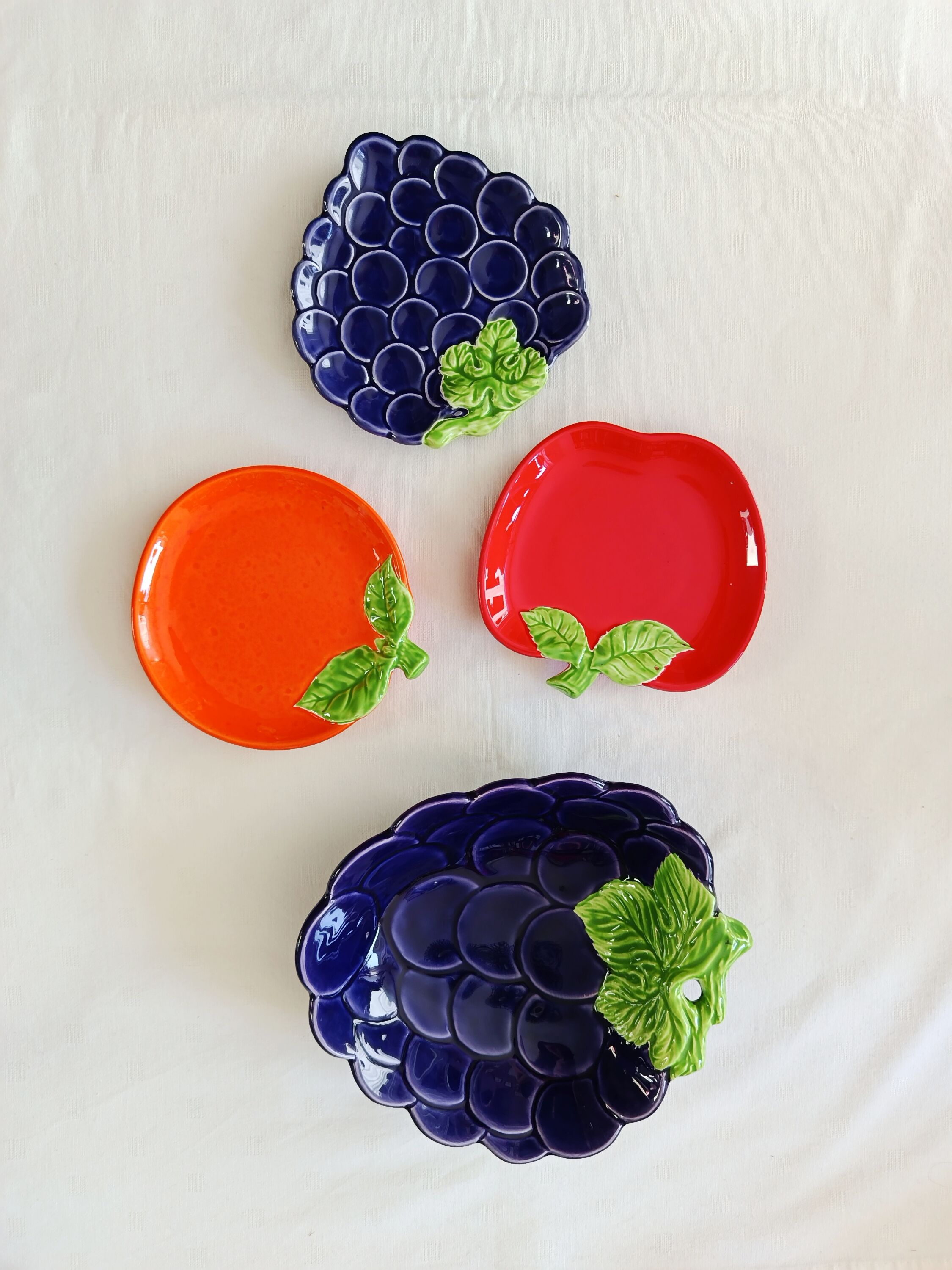 bowls and cups in slipware fruits