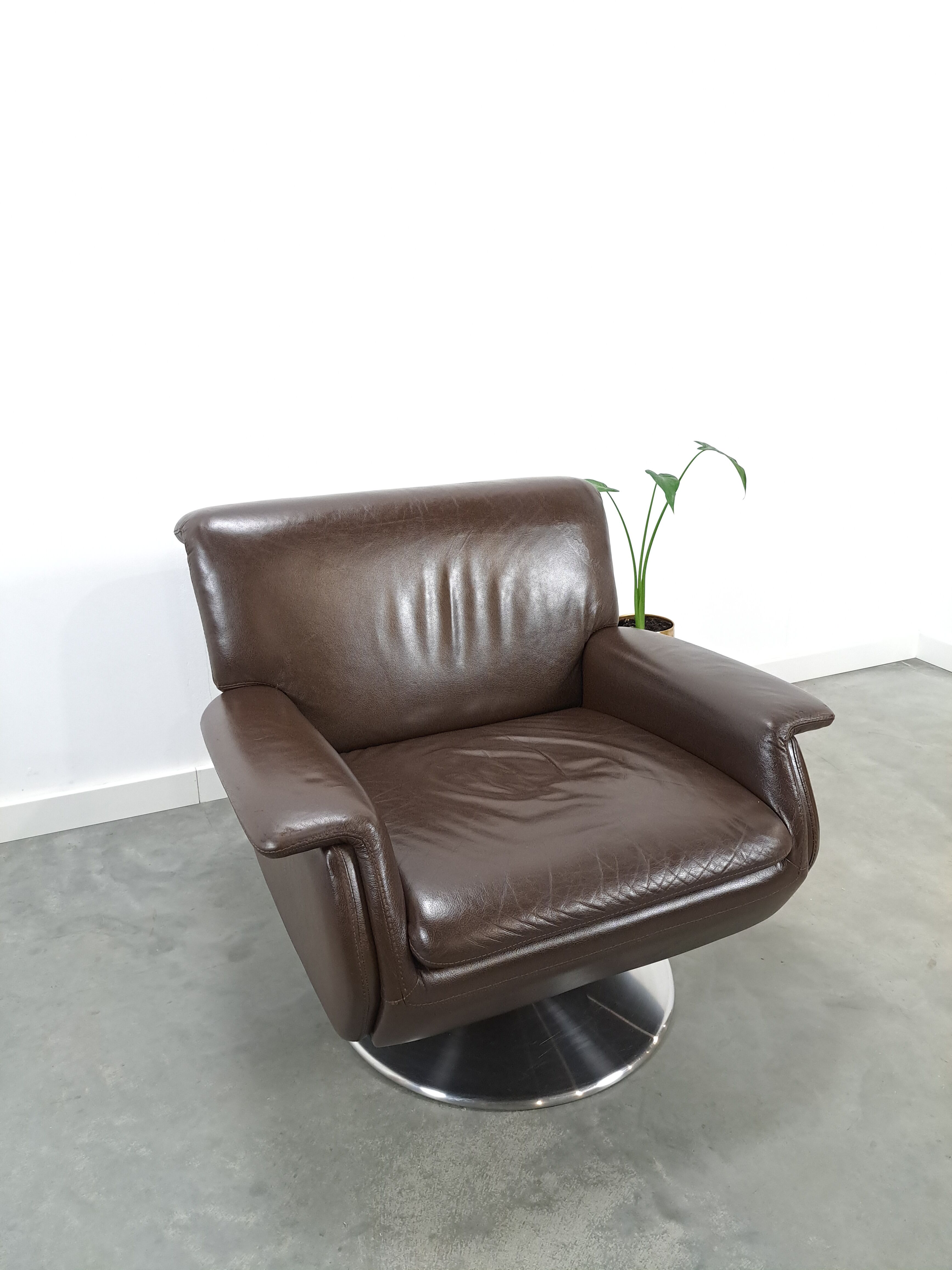 Brown leather swivel chair