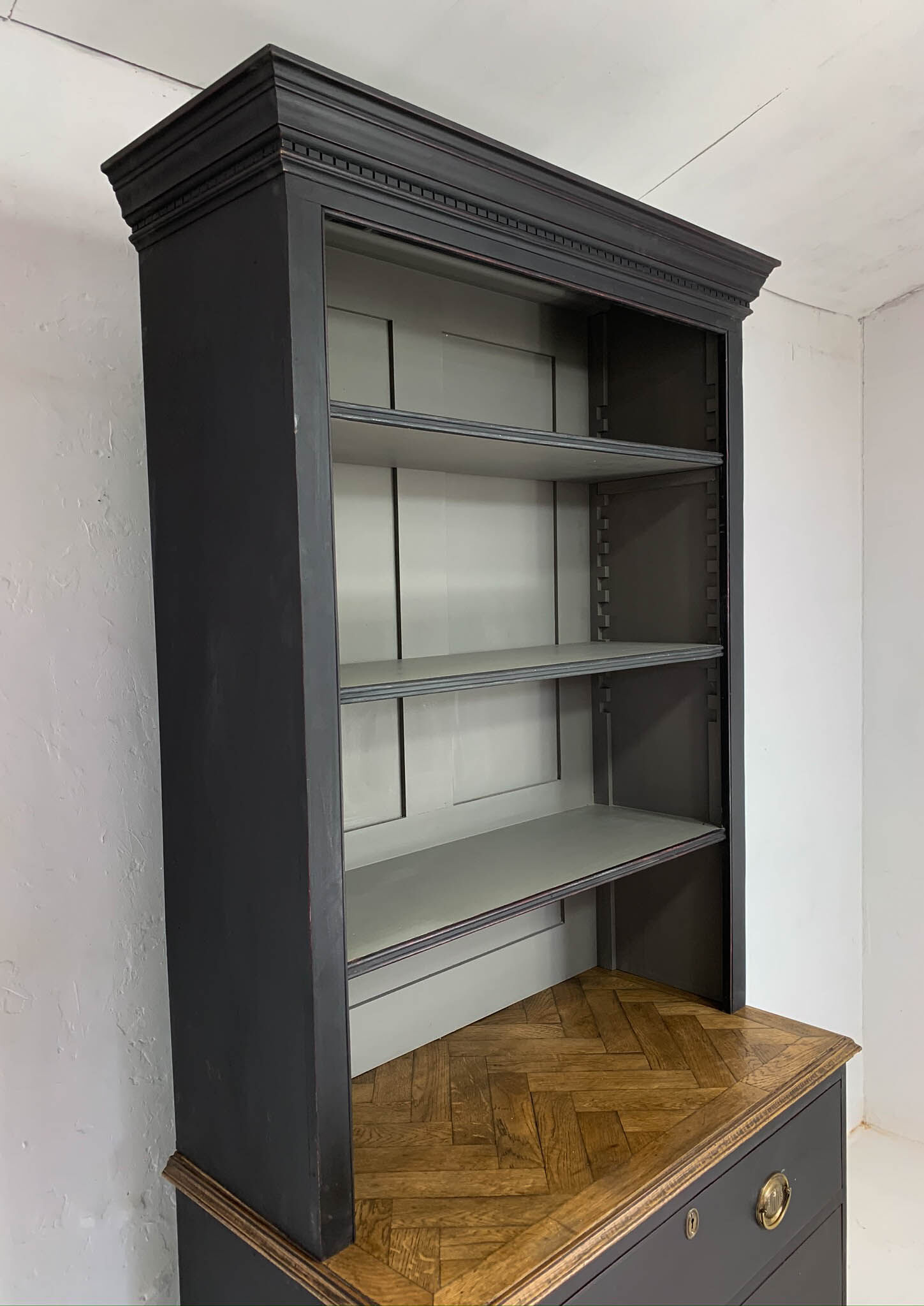 Antique black painted pine bookcase