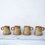 4 sandstone cups signed Jean Pierre Prudhomme