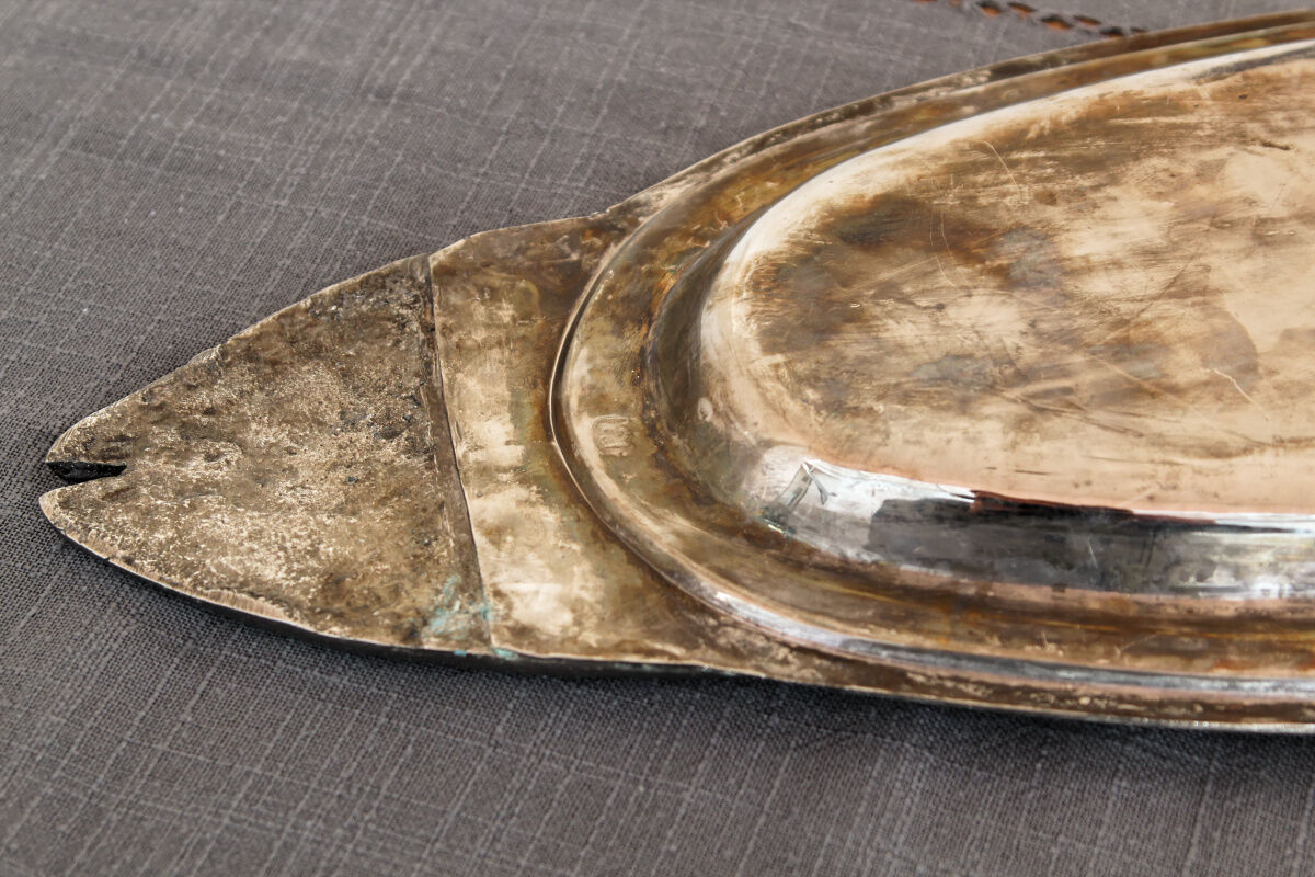 Ancient fish dish in silver metal