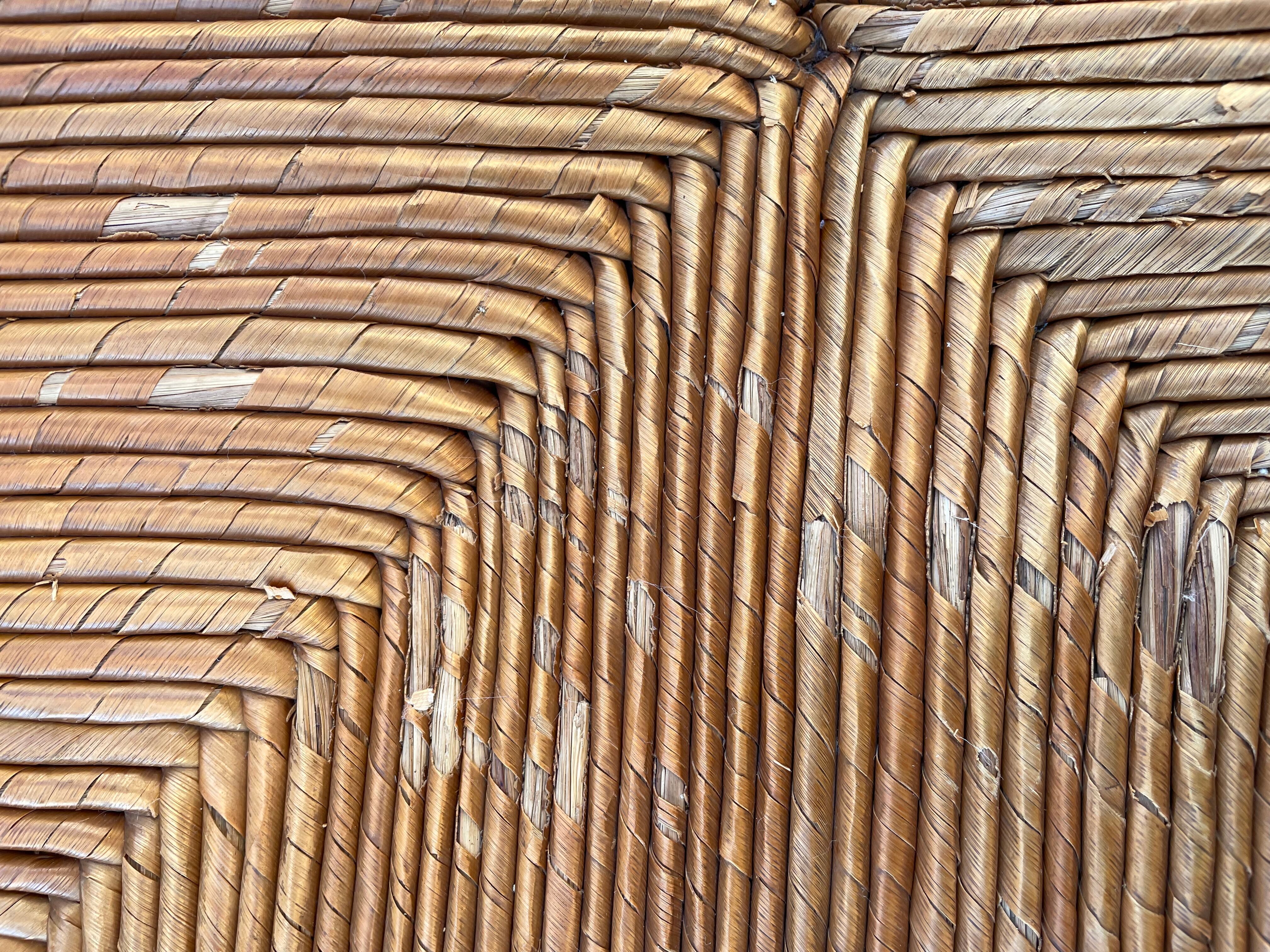 Vintage armchair in straw and brutalist wood