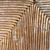 Vintage armchair in straw and brutalist wood