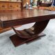 Art Deco dining table with a central cradle base from the 1930s.