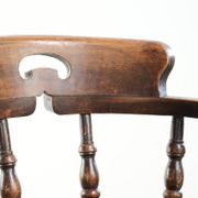 Wooden English antique pub/captain chair from the late 19th century