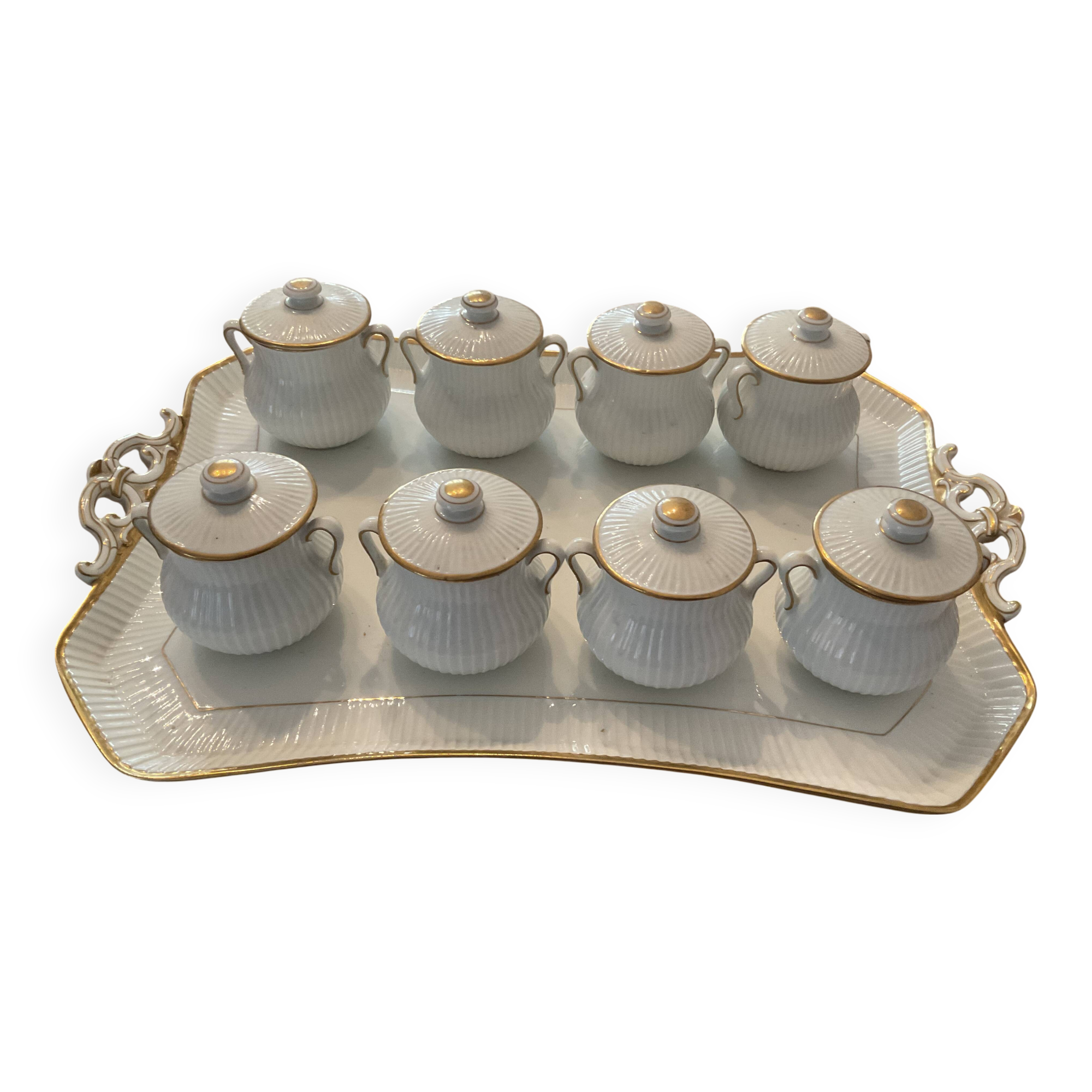 Porcelain tray and 8 matching cream pots. Antique