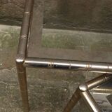 Pair of nesting coffee tables in gold metal with bamboo effect