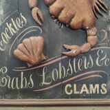 Former Seafood restaurant sign in rare relief