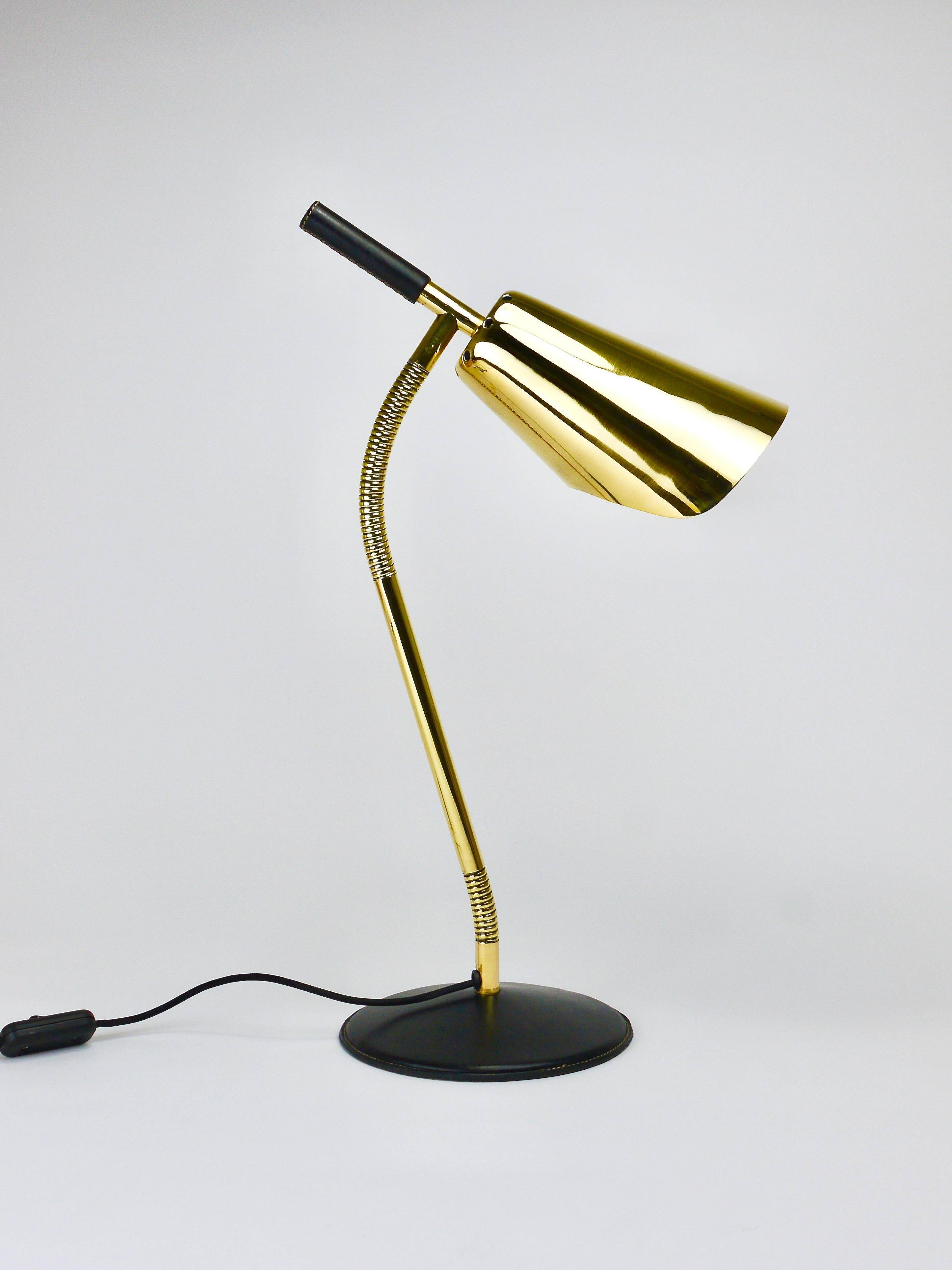 Rare desk and table lamp in brass and leather by Carl Aubock II #4280, Vienna, Austria.