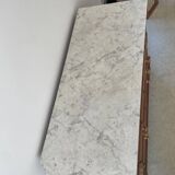 Sandblasted chest of drawers with white marble top