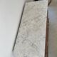 Sandblasted chest of drawers with white marble top