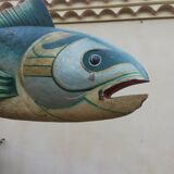 Panel depicting a fish in sheet metal