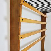 Rare coat rack by Carl Auböck with hat rack, cabinet, brass, walnut and beech, 1950s.