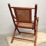 Bamboo folding armchair and caning, leather and brass