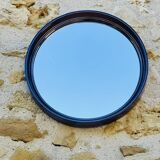 Vintage round smoked plastic mirror, circa 1970s.
