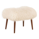 Pouf danois des années 60 en peau de mouton à poils longs.