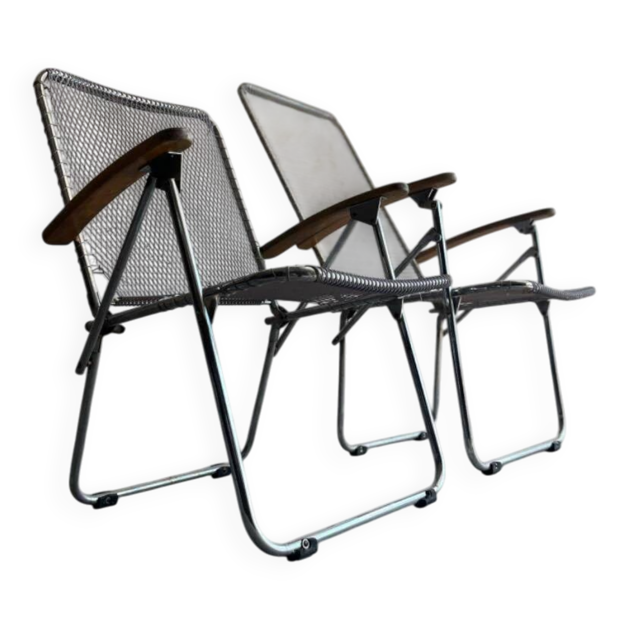 Pair of vintage silver aluminum wire folding chairs with wooden armrests — industrial minimalist