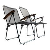 Pair of vintage silver aluminum wire folding chairs with wooden armrests — industrial minimalist