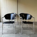 Set of four Italian black leather chairs, 1970