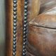 Set of two rugged sheep let of two rugged sheep leather club armchairs with a nice distressed look