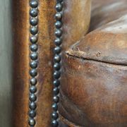Set of two rugged sheep let of two rugged sheep leather club armchairs with a nice distressed look