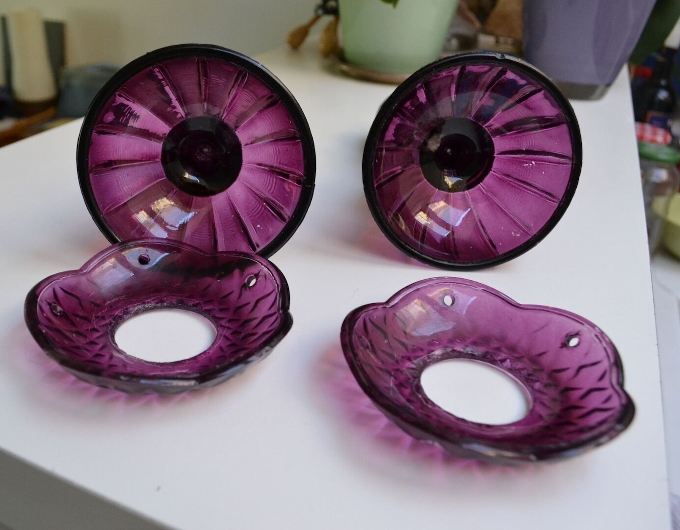 Pair of purple glass candlesticks