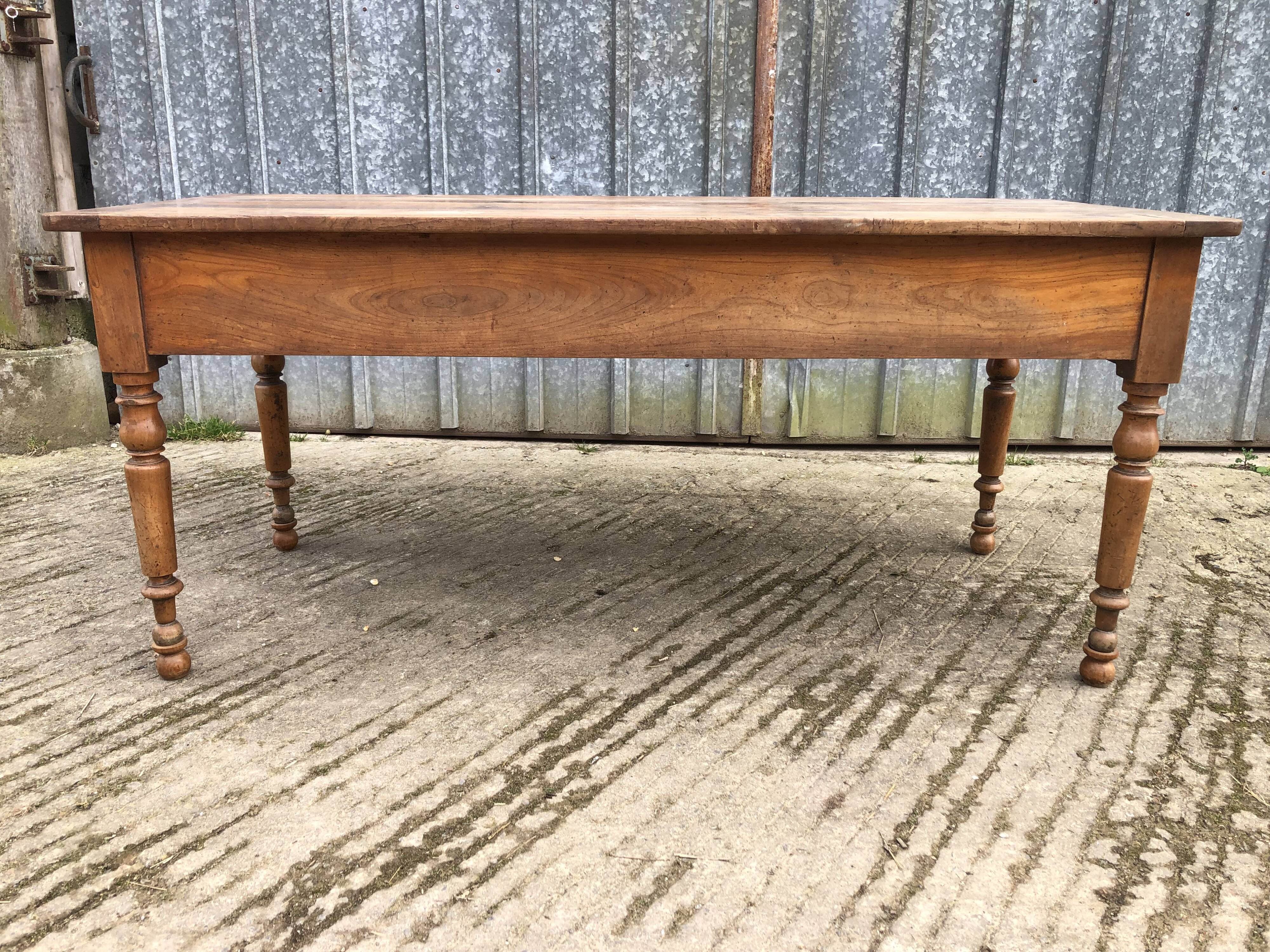 Antique cherry farmhouse table with 2 drawers and 1 pull-out