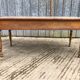 Antique cherry farmhouse table with 2 drawers and 1 pull-out