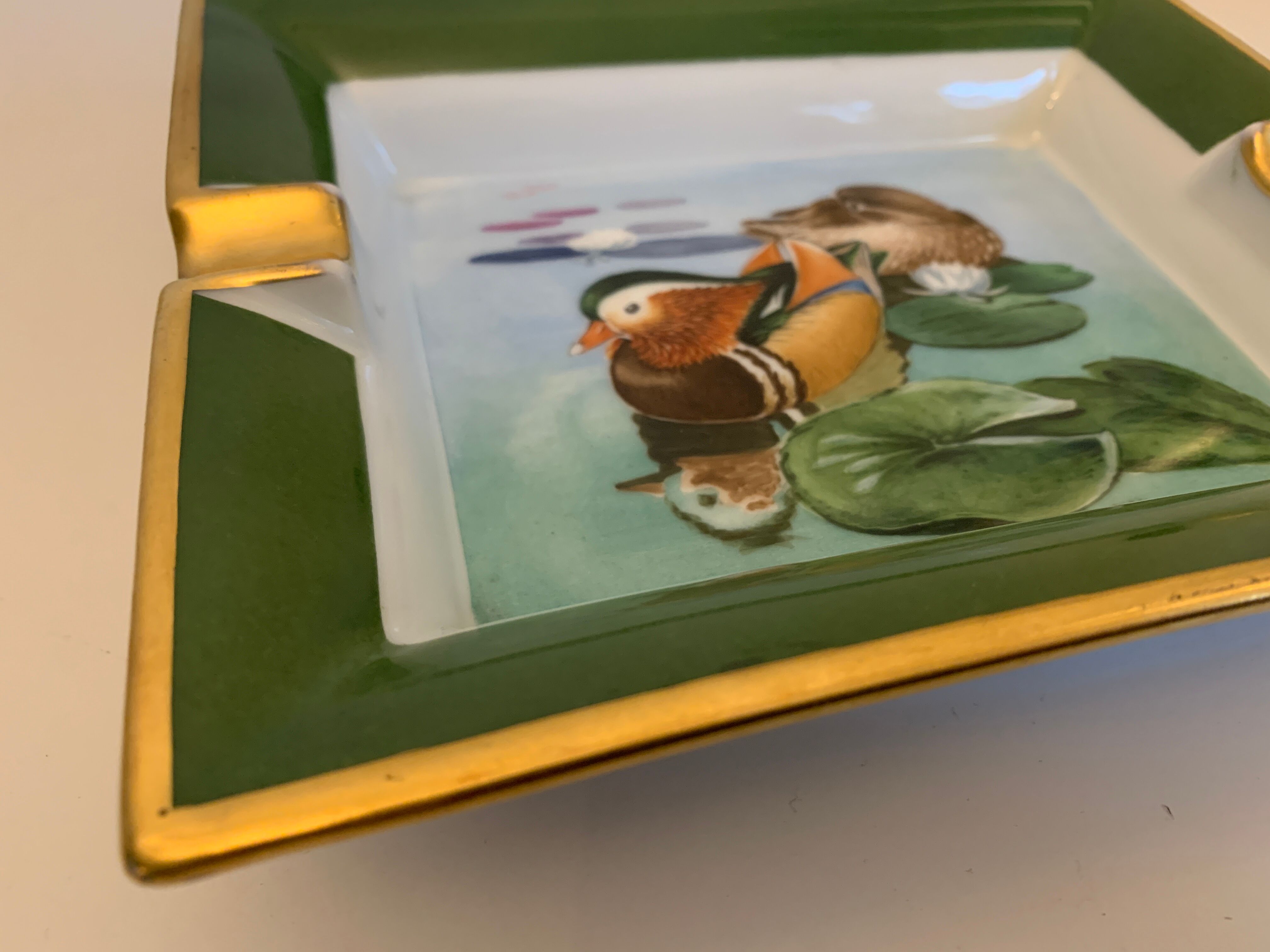 Hermès ashtray signed Rybal in fine Limoges porcelain decorated with mandarin ducks