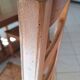 Set of 6 solid oak chairs with straw seats.