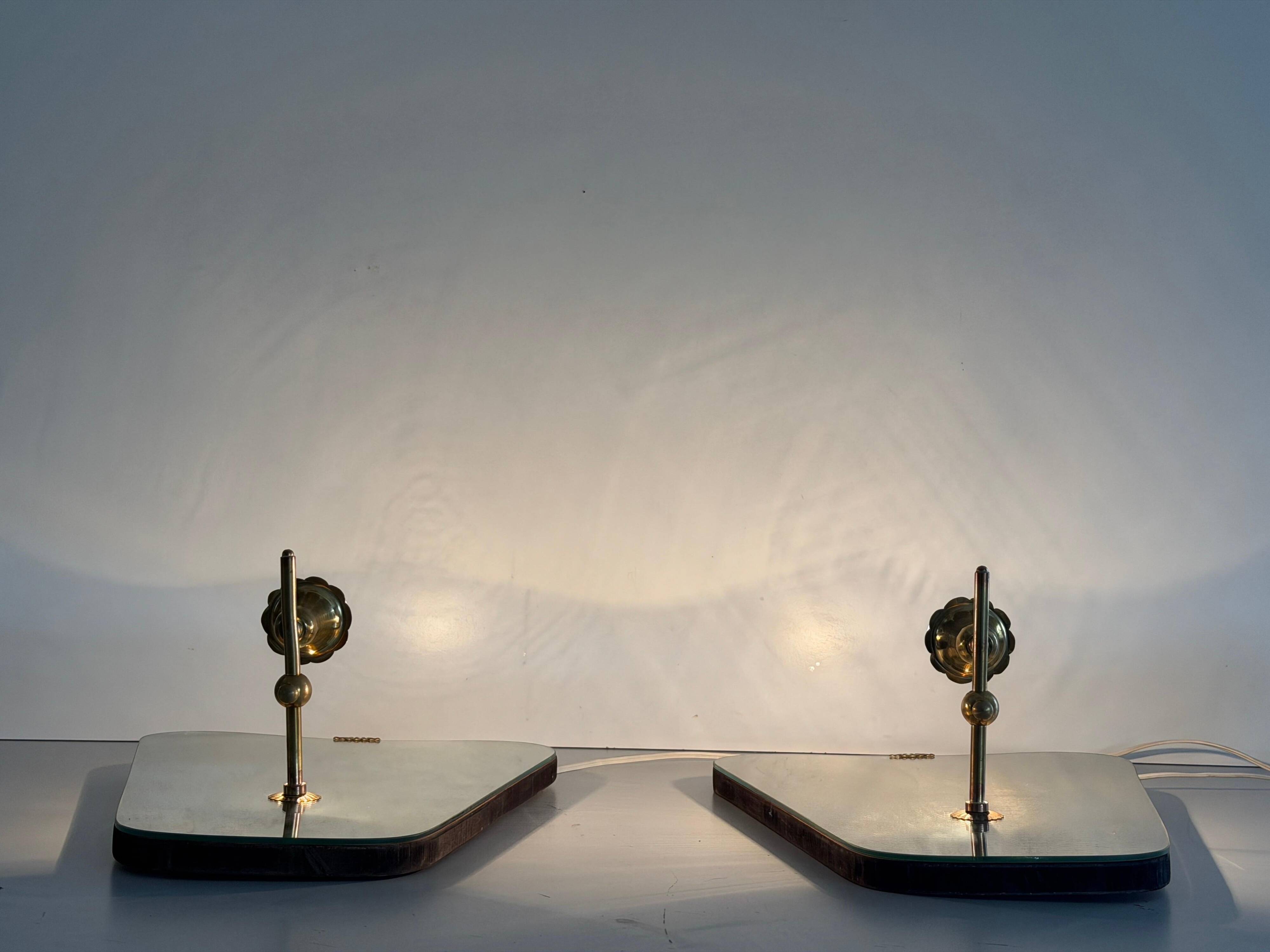 Pair of brass wall lights with mirrors, mid-20th century, Italy, 1960.