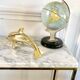 Vintage brass dolphin