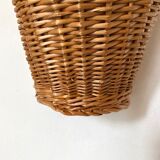 Braided wicker wall basket