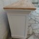 Craft furniture enhanced in pearl gray, shelves and top in raw wood.