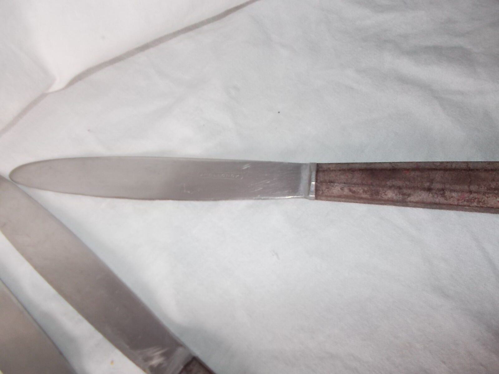 Set of brown Bakelite handle knives