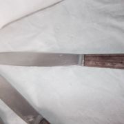 Set of knives with brown Bakelite handles.