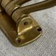 Adjustable nautical coat hook in solid brass