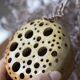 Signed sandstone flower pick