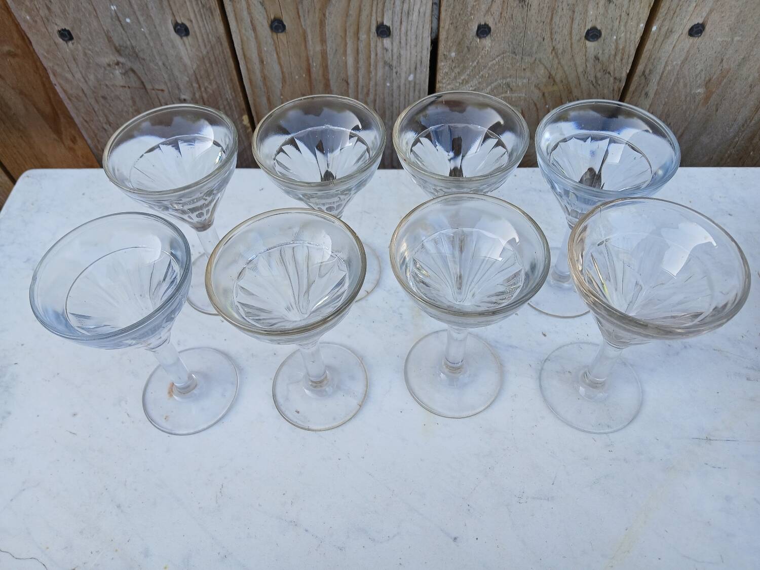 Set of 8 very thick antique stemmed glasses.
