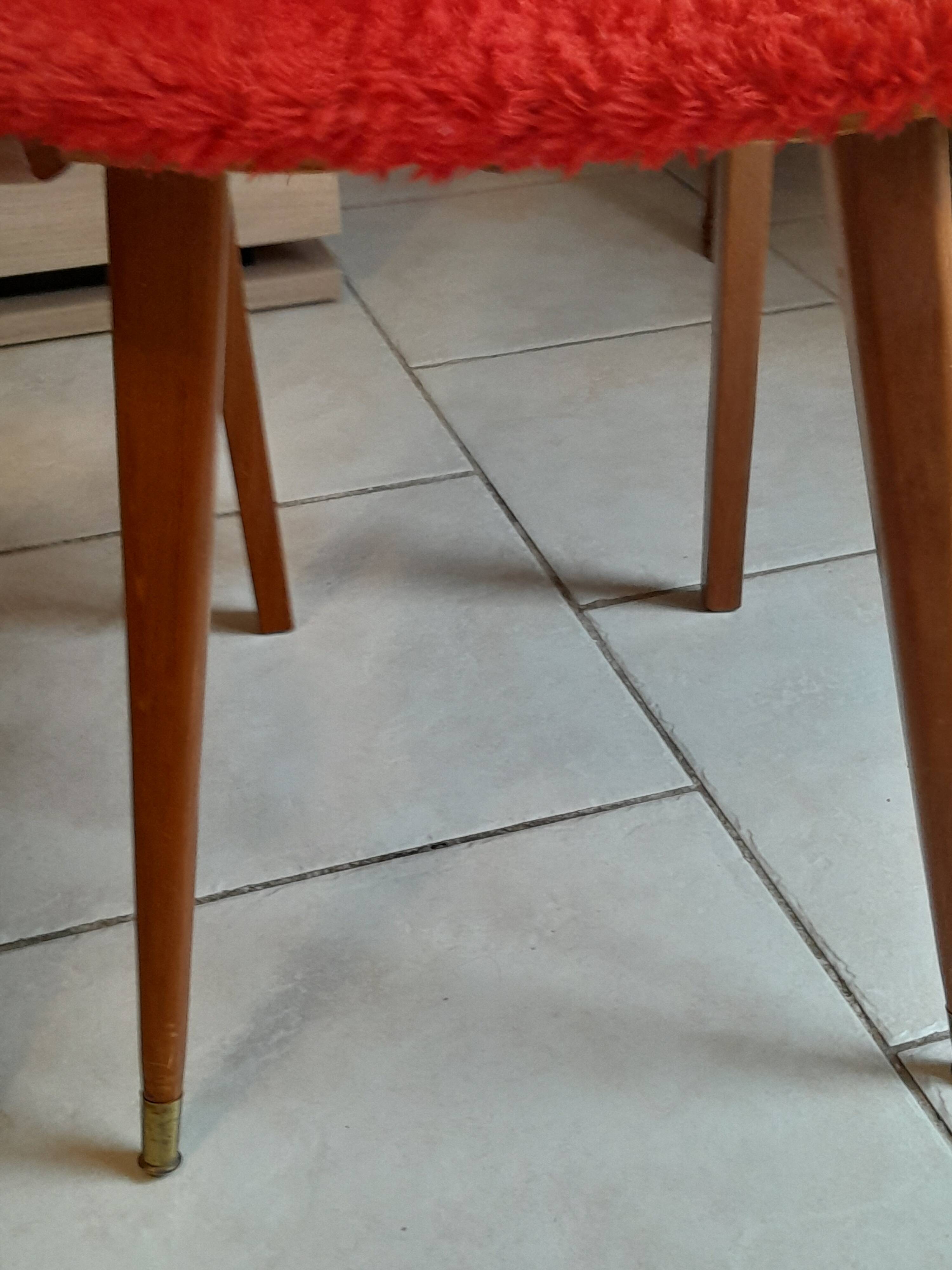 Pair of vintage red moumoute chairs with compass legs