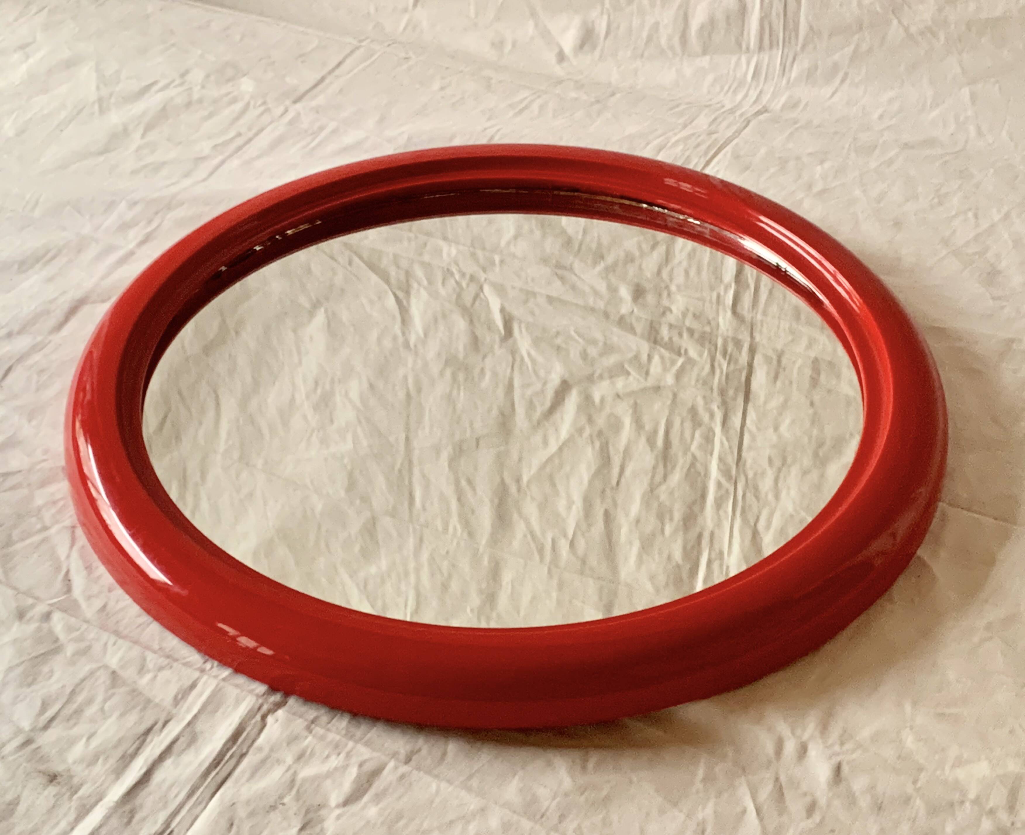 Vintage round red plastic mirror