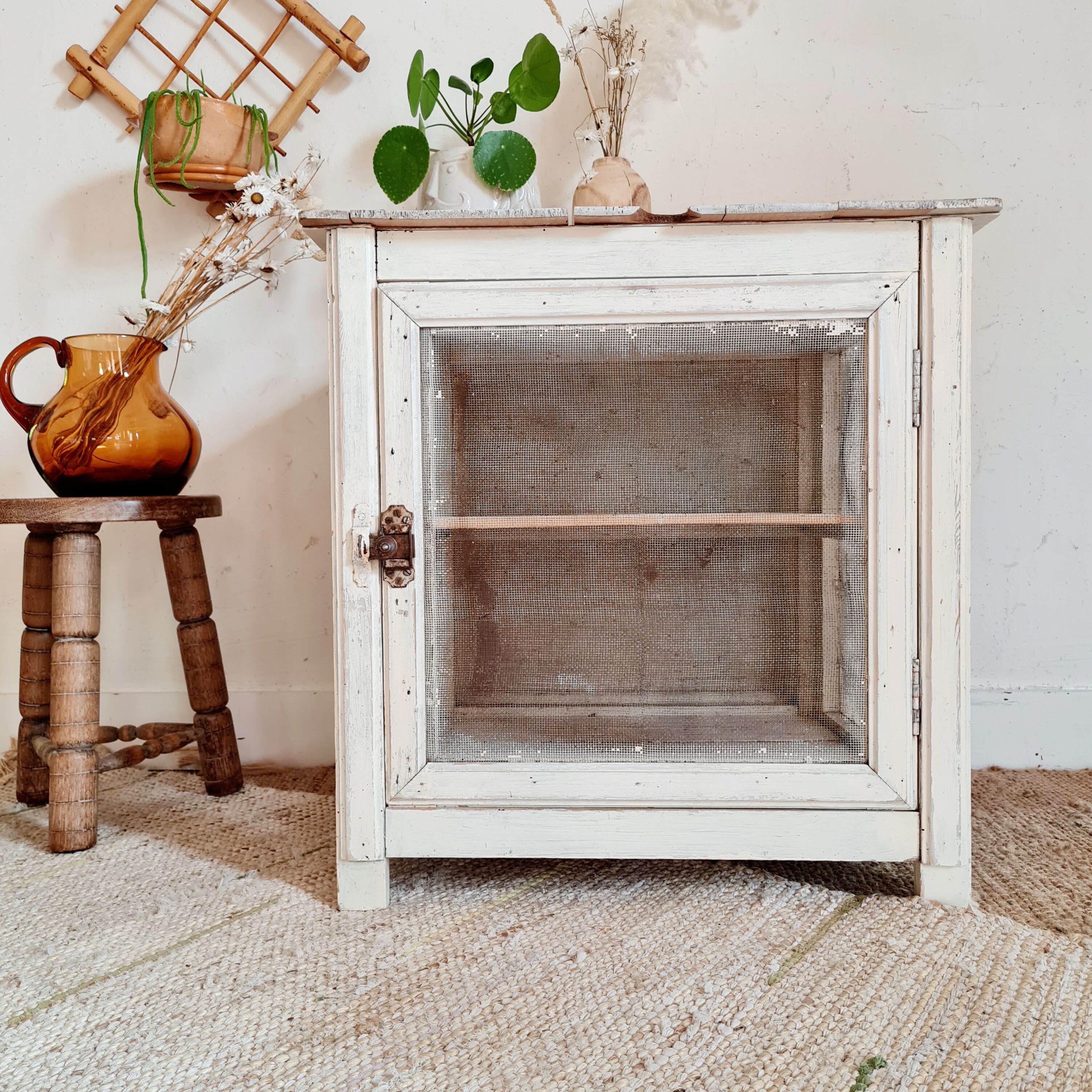 Wooden pantry and white mesh