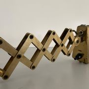 Cream metal and brass wall lamp with scissors design by Karl Lang for SIS Licht, 1950s, Germany.