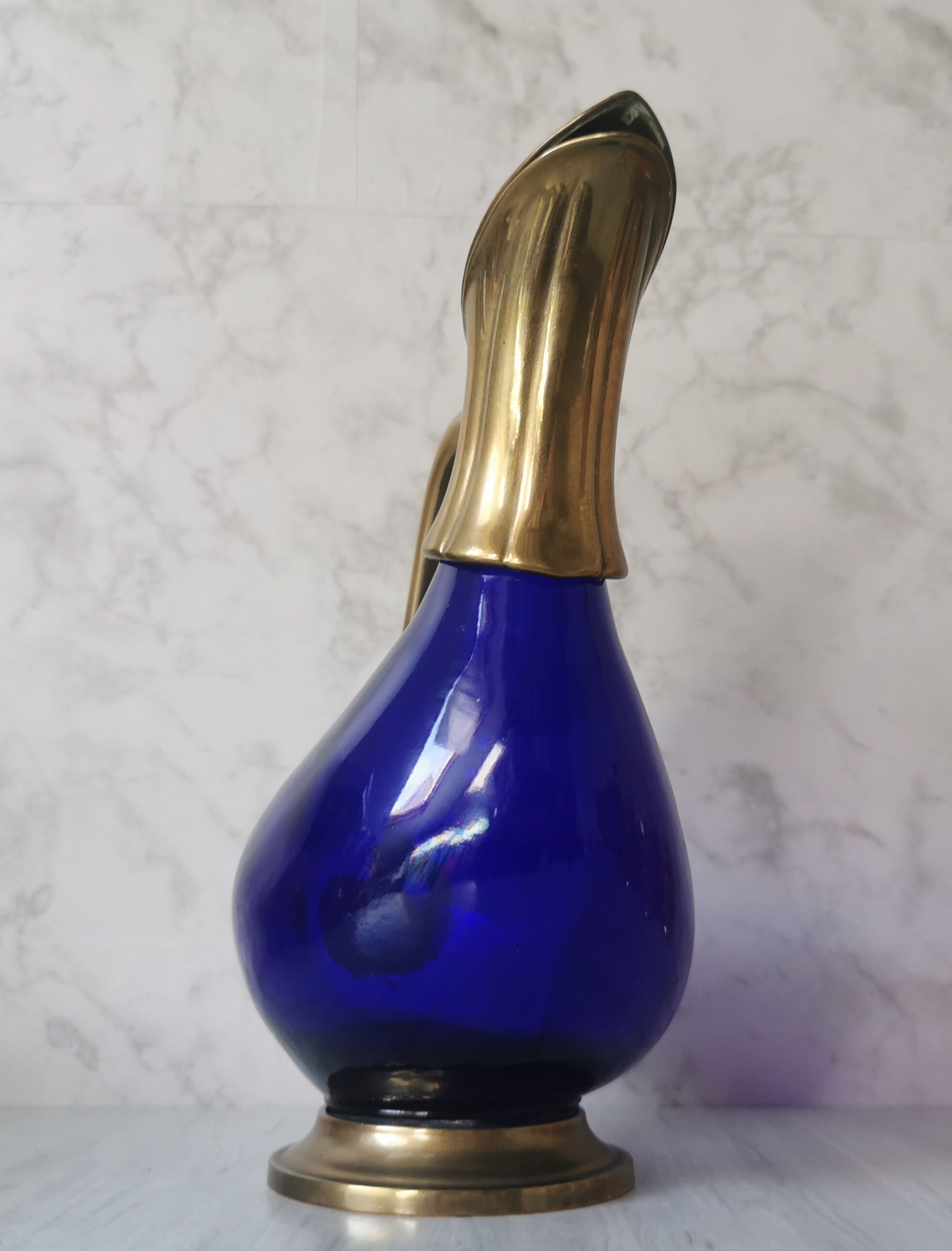 Glass and brass decanter
