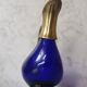 Glass and brass decanter